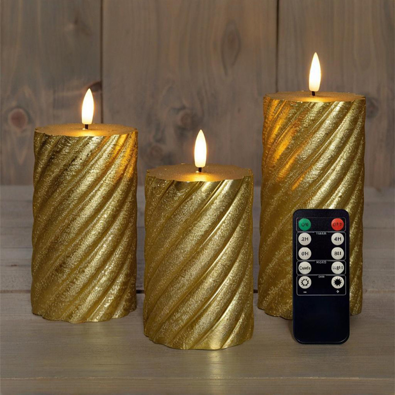 Set di 3 candele a colonna LED a spirale dorata
