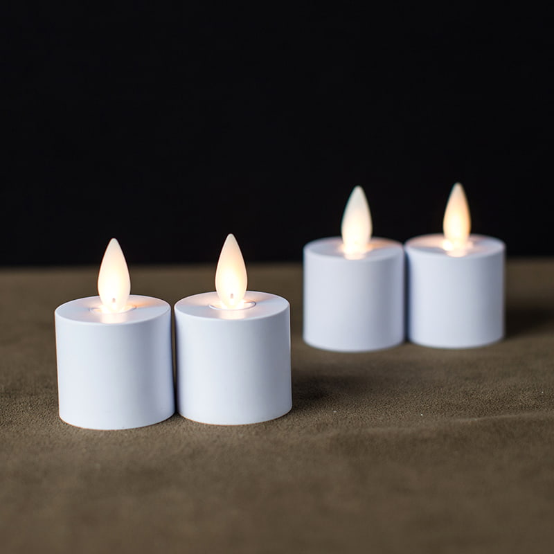 Confezione da 4 candele bianche induttive ricaricabili senza fiamma